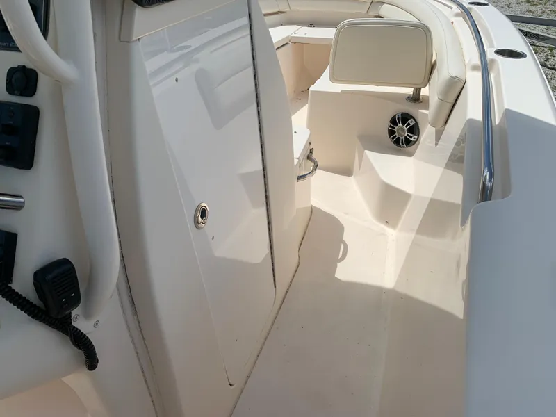 Slide: The Image of 2020 Grady-White 236 Fisherman boat interior with seating and control panel. - 26