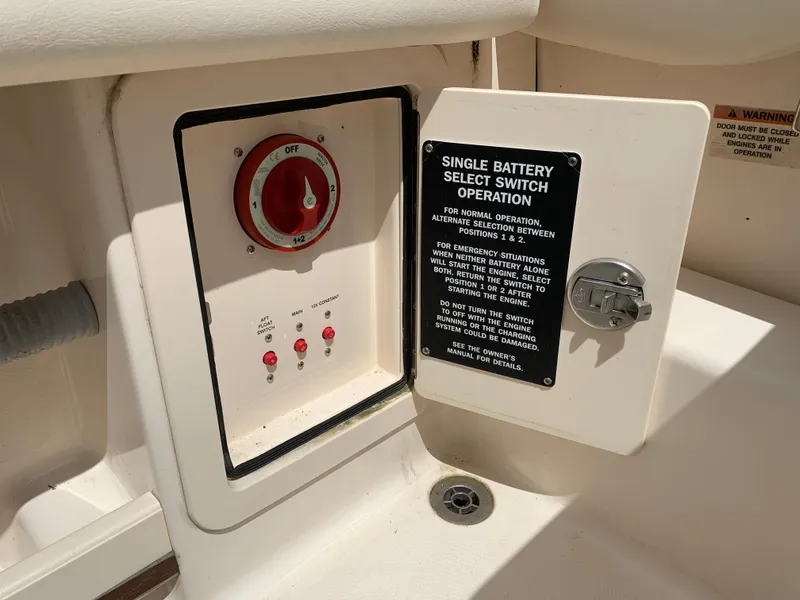 Slide: The Image of Battery switch panel on 2020 Grady-White 236 Fisherman boat, featuring operation instructions. - 35