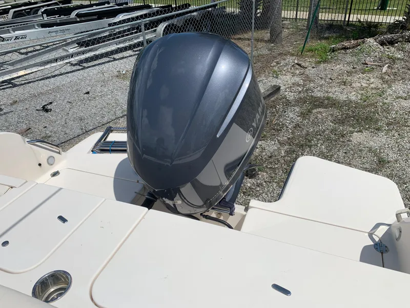 Slide: The Image of 2020 Grady-White 236 Fisherman boat with Yamaha outboard motor, parked on gravel. - 39