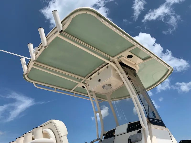 Slide: The Image of 2020 Grady-White 236 Fisherman boat with T-top against a blue sky. - 4