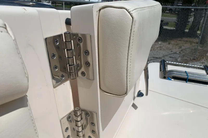 Slide: The Image of Stainless steel hinge on 2020 Grady-White 236 Fisherman boat with cushioned seating. - 42