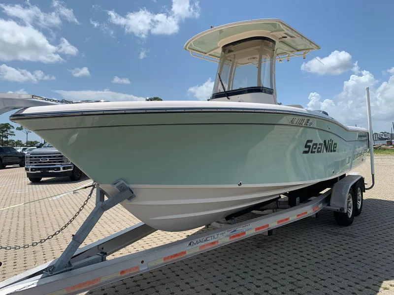 Slide: The Image of 2020 Grady-White 236 Fisherman boat on trailer under blue sky. - 5