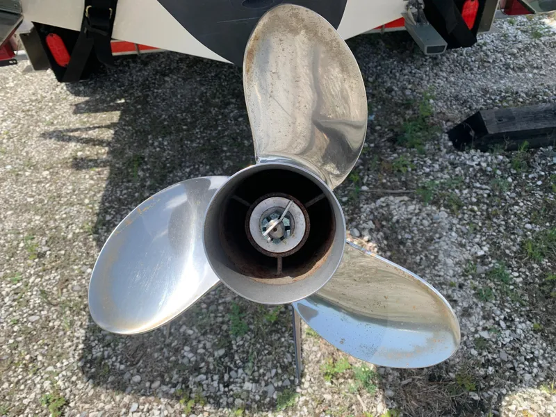 Slide: The Image of Propeller of 2020 Grady-White 236 Fisherman boat on gravel surface. - 9