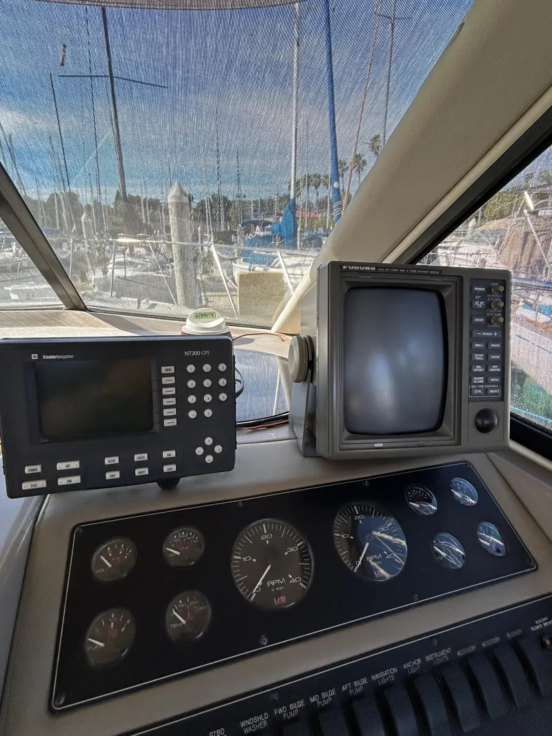 Slide: The Image of 1996 Bayliner 4087 Aft Cabin Motoryacht dashboard with navigation instruments and gauges. - 20