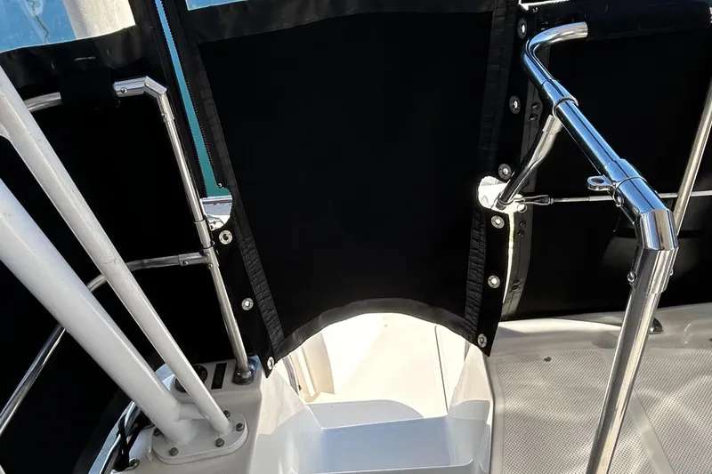 Slide: The Image of 1996 Bayliner 4087 Aft Cabin Motoryacht deck with black canvas and stainless steel railings. - 27