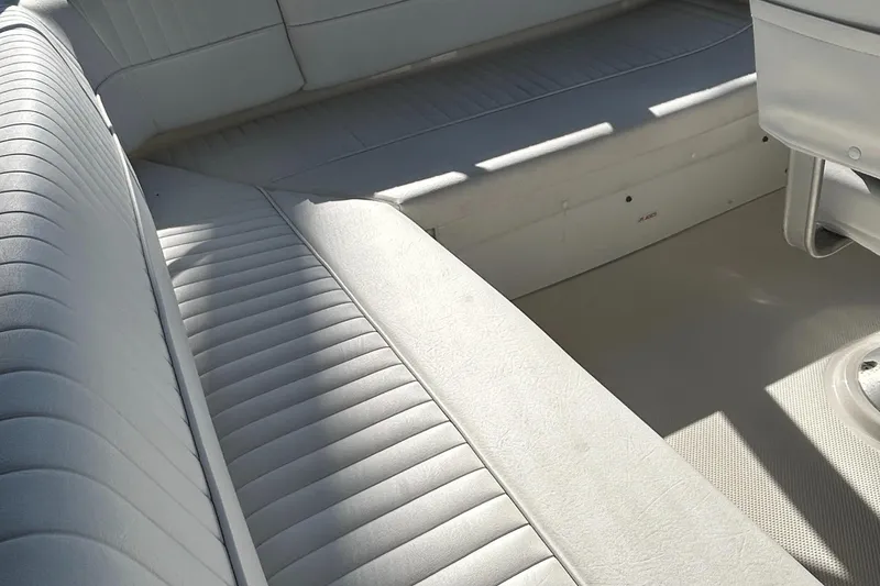 Slide: The Image of 1996 Bayliner 4087 Aft Cabin Motoryacht interior seating area with light upholstery. - 7