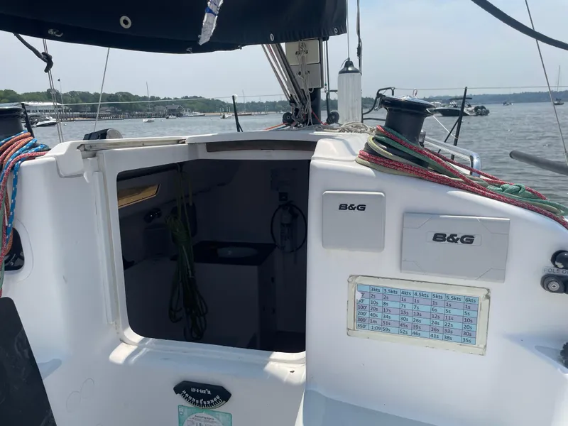 Slide: The Image of Cockpit view of a 2014 J Boats J 88 sailboat with B&G equipment and colorful ropes. - 11