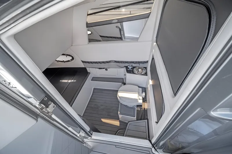Slide: The Image of Interior of 2021 Nor-Tech 390 Sport Center Console boat, featuring modern design and amenities. - 39