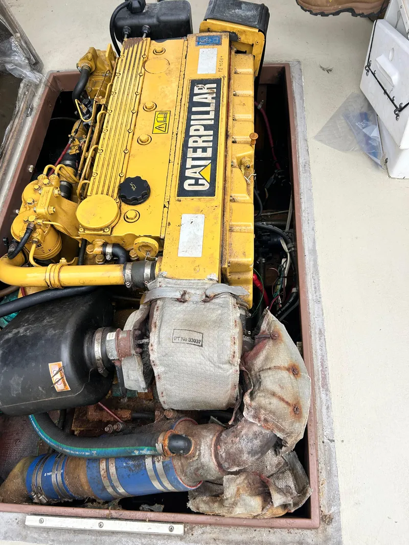 Slide: The Image of Caterpillar engine in 1991 Fortier 26 Hard Top boat, detailed view. - 8