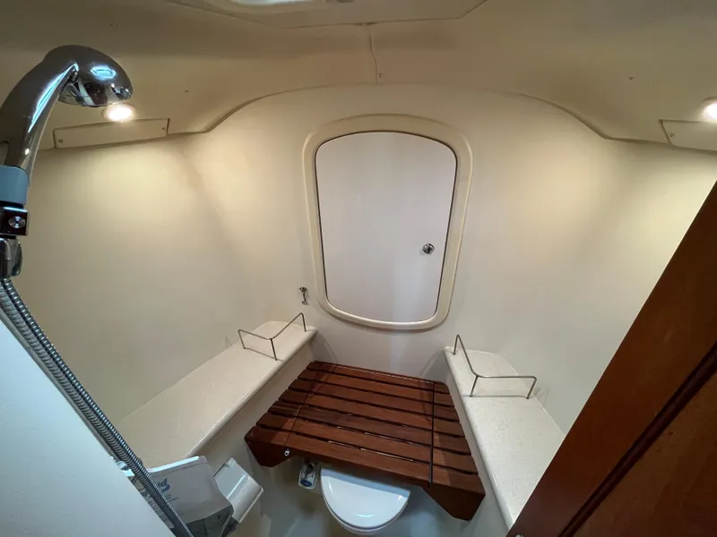Slide: The Image of Bathroom interior of 2004 Hunter 41 yacht with shower and wooden seat. - 47