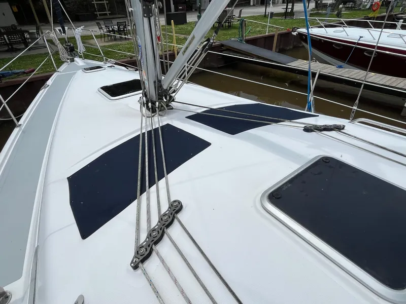 Slide: The Image of Deck of 2004 Hunter 41 sailboat with rigging and hatches. - 8