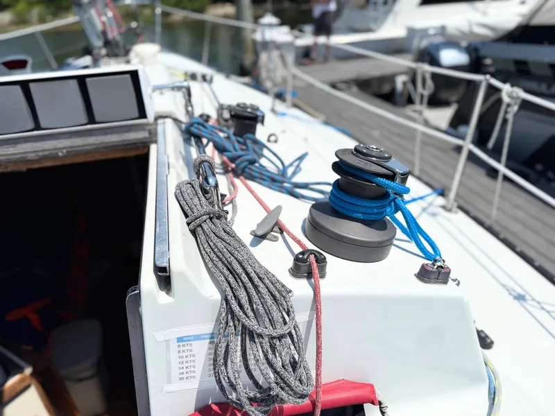 Slide: The Image of Sailboat deck with ropes and winch, Tartan Thomas 35, 1991 model. - 15