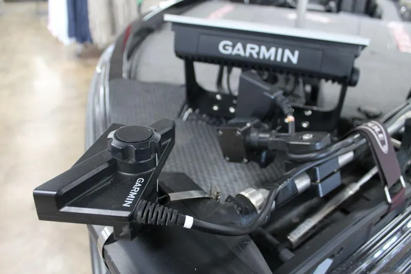 Slide: The Image of Garmin equipment on a 2025 Phoenix 21 XE boat, featuring advanced navigation technology. - 9