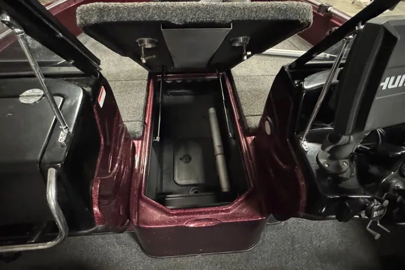 Slide: The Image of Open storage compartment of 2019 Nitro ZV19 Sport boat, showcasing interior space and design. - 16