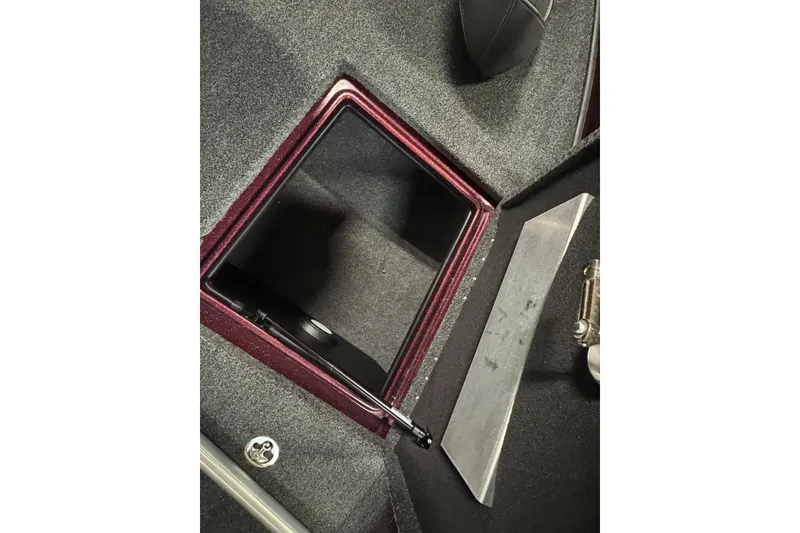 Slide: The Image of Open storage compartment in 2019 Nitro ZV19 Sport boat interior. - 21