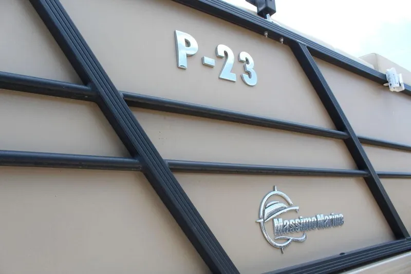 Slide: The Image of Massimo Marine P-23 TRITOON 2022 boat exterior with logo and model name. - 17