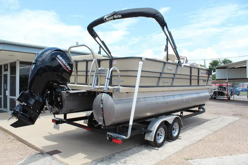 Slide: The Image of 2022 Massimo Marine P-23 TRITOON boat on trailer, featuring Mercury outboard motor. - 5