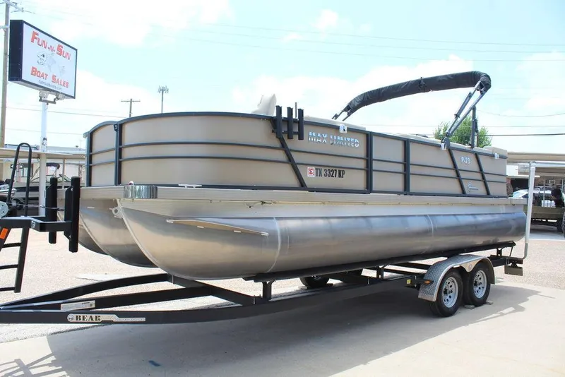 Slide: The Image of 2022 Massimo Marine P-23 TRITOON pontoon boat on trailer at dealership. - 8