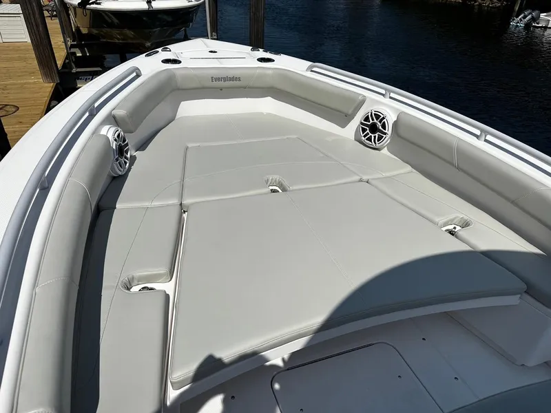 Slide: The Image of 2023 Everglades 243 Center Console boat with spacious seating and sleek design. - 10