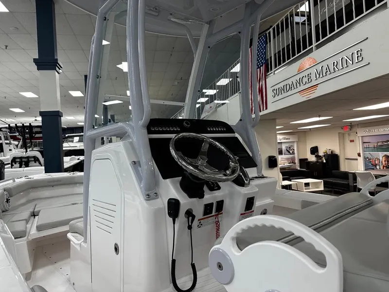 Slide: The Image of 2023 Everglades 243 Center Console boat interior at Sundance Marine showroom. - 9