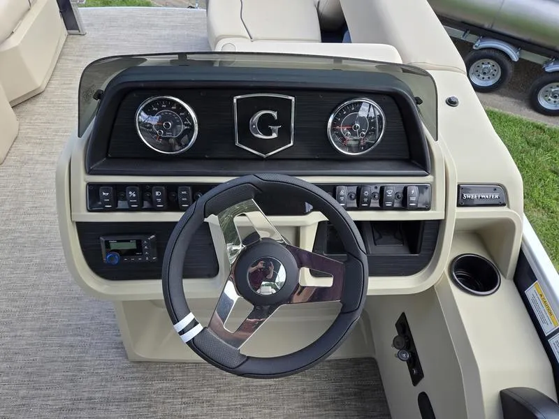 Slide: The Image of Steering console of 2025 Godfrey Sweetwater 2086 FS Sport Tube boat. - 11