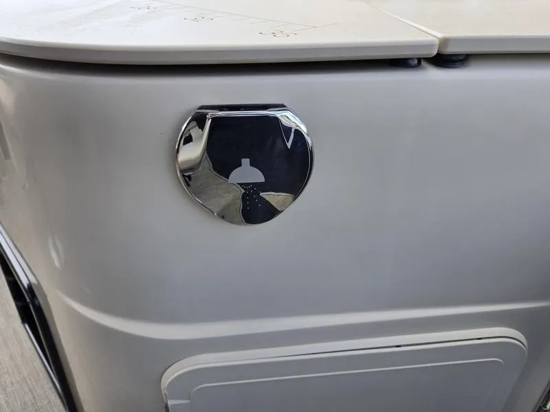 Slide: The Image of Chrome shower symbol on 2025 Godfrey Sweetwater 2086 FS Sport Tube boat. - 19