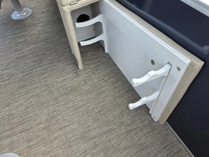 Slide: The Image of Interior of 2025 Godfrey Sweetwater 2086 FS Sport Tube, featuring rod holders and seating. - 3