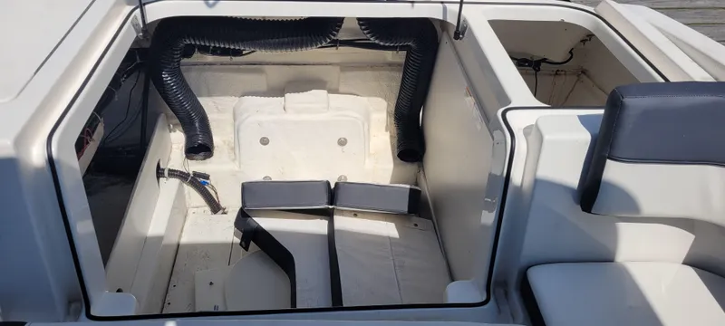 Slide: The Image of 2020 Bayliner VR5 Bowrider OB engine compartment, showcasing interior details and components. - 26