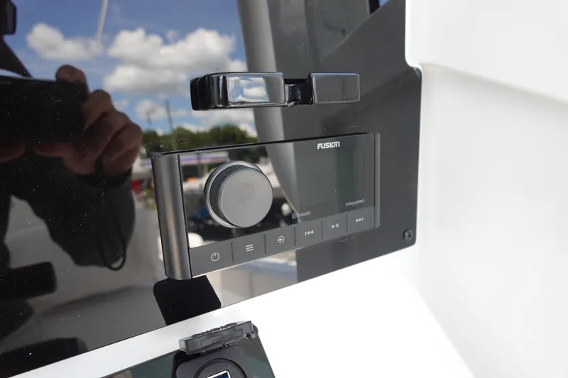 Slide: The Image of Fusion audio system on 2026 Sea Hunt Ultra 235 SE boat dashboard. - 17