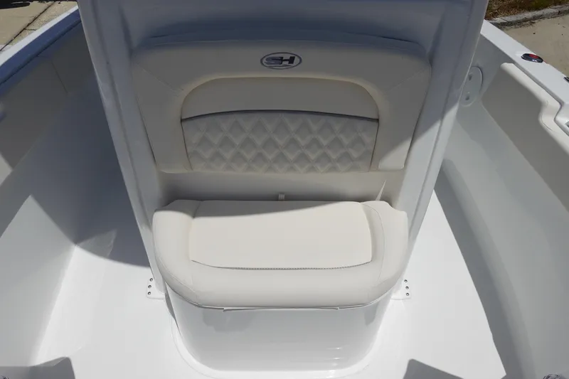 Slide: The Image of 2026 Sea Hunt Ultra 235 SE boat seat with diamond-patterned upholstery. - 26