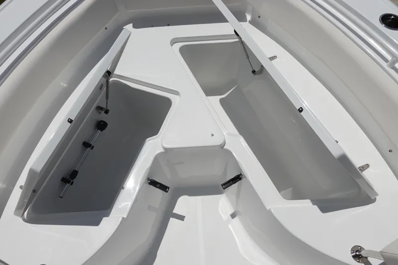 Slide: The Image of 2026 Sea Hunt Ultra 235 SE boat storage compartments, open and spacious design. - 31