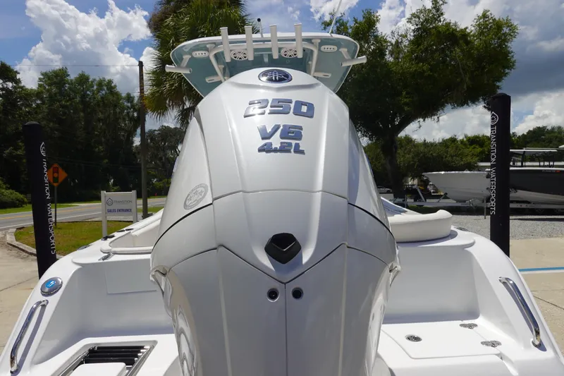 Slide: The Image of 2026 Sea Hunt Ultra 235 SE boat with powerful 250 V6 4.2L engine. - 6