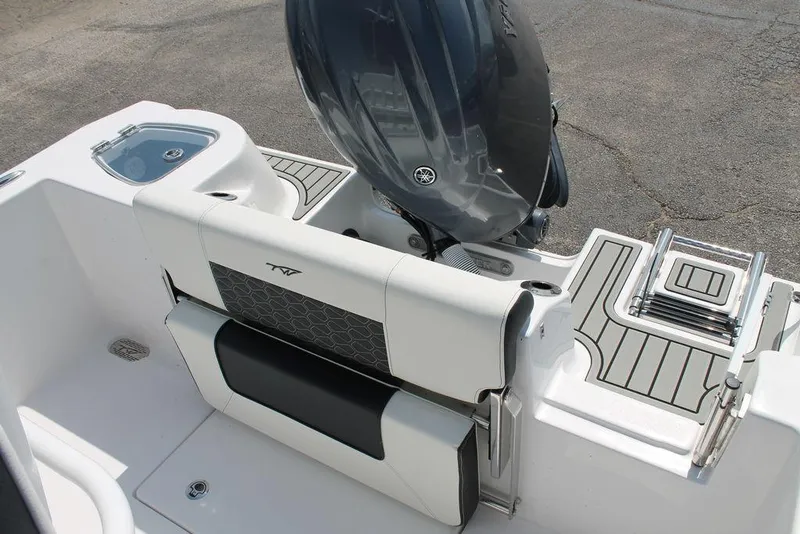 Slide: The Image of 2025 Tidewater 210 CC Adventure boat with Yamaha engine and sleek seating design. - 13