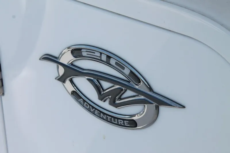 Slide: The Image of 2025 Tidewater 210 CC Adventure logo on white surface. - 14