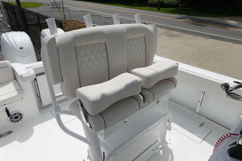 Slide: The Image of 2026 Sea Hunt Gamefish 25 boat interior with cushioned seating and modern design. - 18