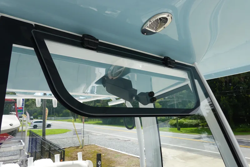 Slide: The Image of 2026 Sea Hunt Gamefish 25 boat window detail with sleek design and modern features. - 21