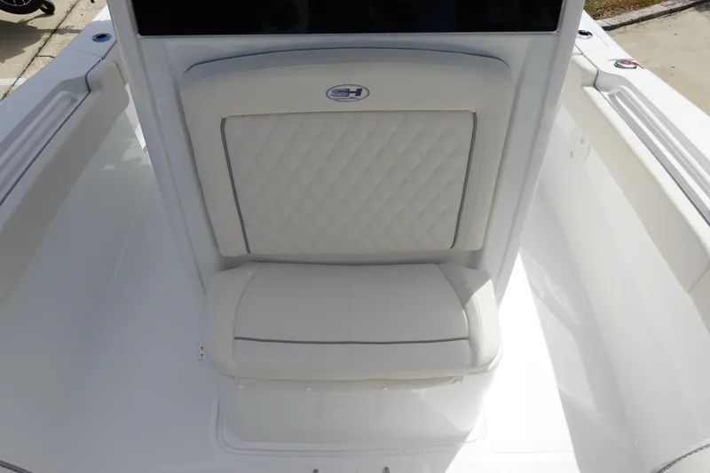 Slide: The Image of 2026 Sea Hunt Gamefish 25 boat seat with quilted upholstery and logo. - 23