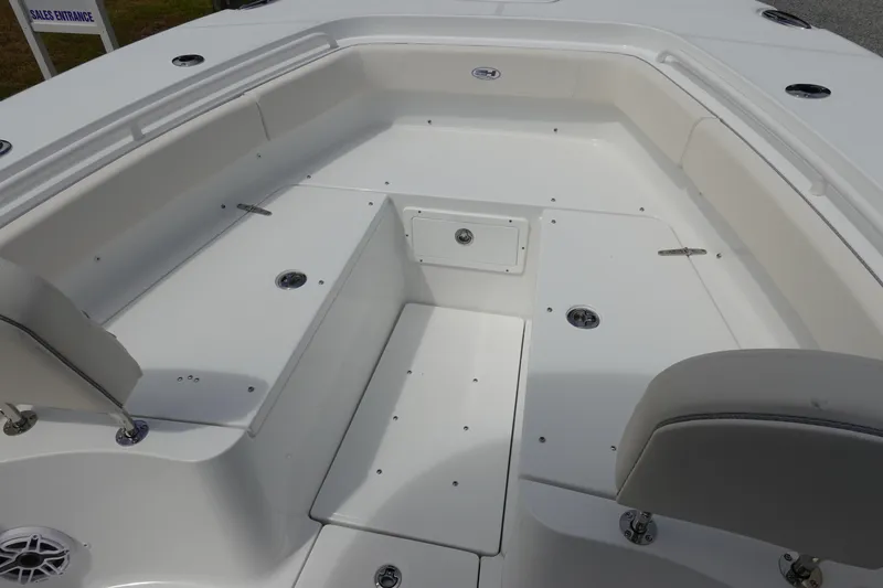 Slide: The Image of 2026 Sea Hunt Gamefish 25 boat interior with spacious seating and storage compartments. - 28