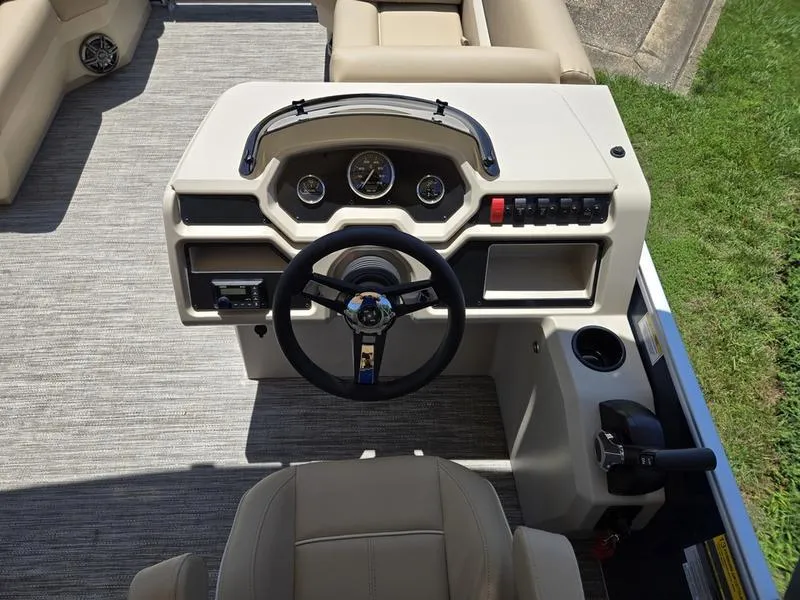 Slide: The Image of 2025 Godfrey Xperience 2286 SFLX Sport Tube helm with steering wheel and control panel. - 8