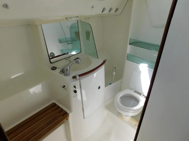 Slide: The Image of Bathroom of 2005 Beneteau Oceanis Clipper 323 yacht with sink, toilet, and mirror. - 35