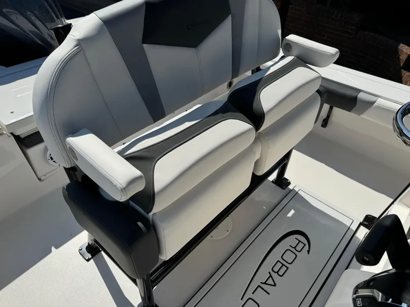 Slide: The Image of 2025 Robalo R246 CAYMAN boat seating with sleek, modern design and comfortable upholstery. - 10
