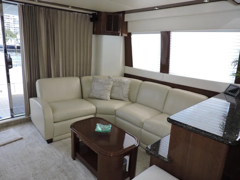 Slide: The Image of Luxurious interior of 2010 Carver 56 Voyager SE yacht with cream leather seating. - 10