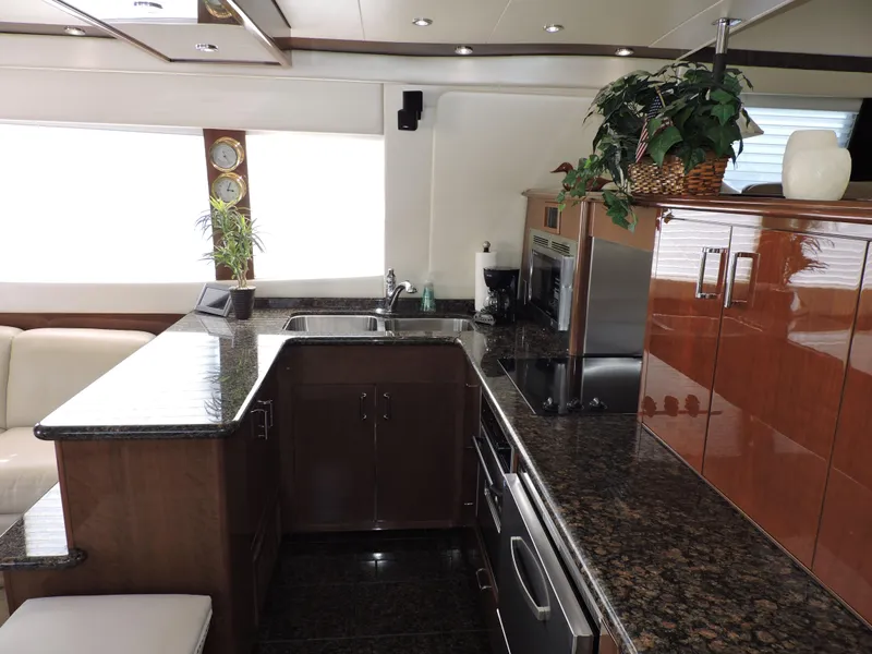Slide: The Image of Luxurious kitchen interior of 2010 Carver 56 Voyager SE yacht with granite countertops. - 11