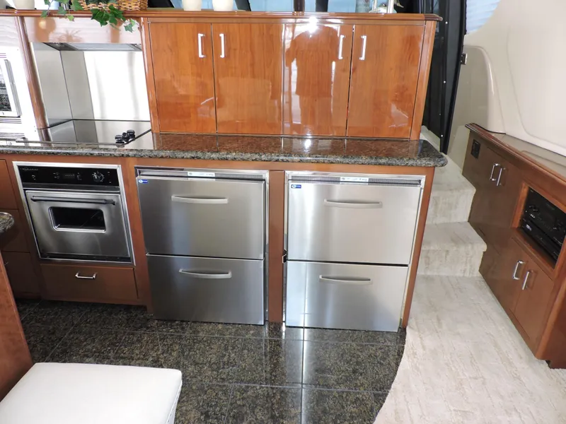 Slide: The Image of Luxurious kitchen interior of 2010 Carver 56 Voyager SE yacht with stainless steel appliances. - 14