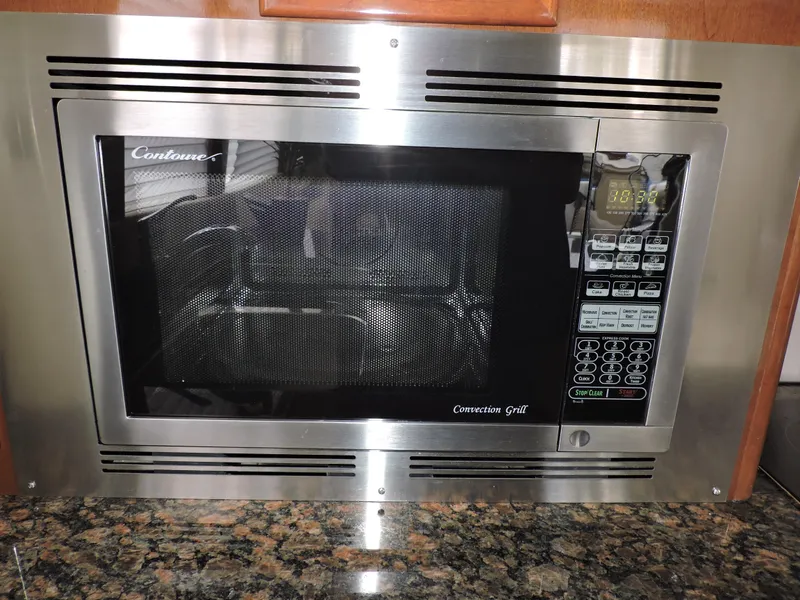 Slide: The Image of Built-in microwave oven in a 2010 Carver 56 Voyager SE yacht kitchen. - 17