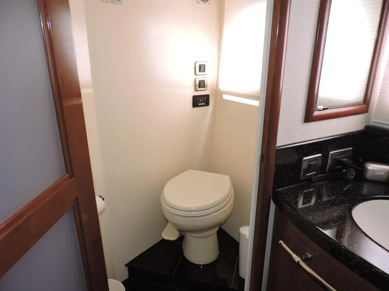 Slide: The Image of 2010 Carver 56 Voyager SE bathroom with modern fixtures and sleek design. - 39