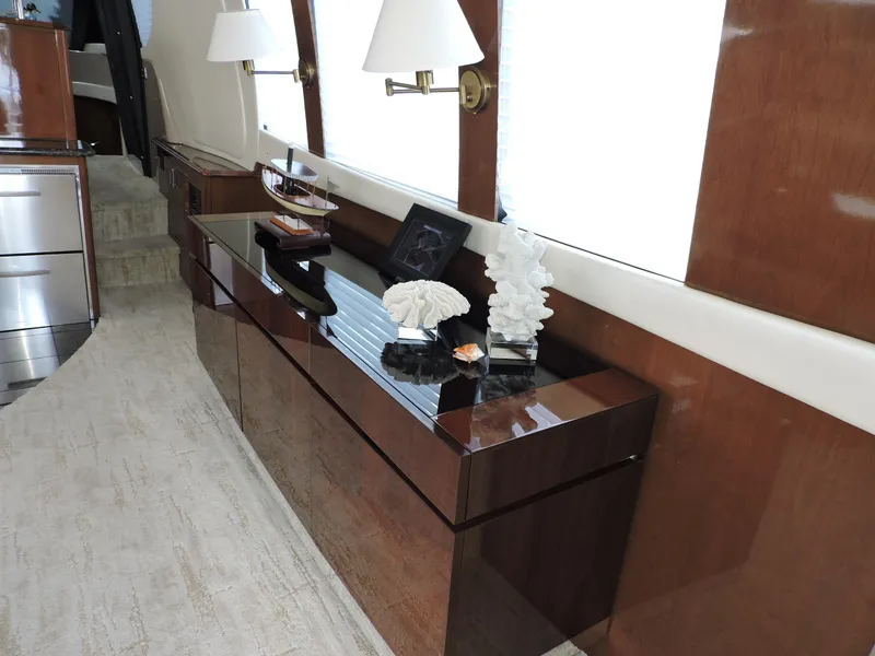 Slide: The Image of Luxurious interior of 2010 Carver 56 Voyager SE yacht with elegant wooden cabinetry. - 9