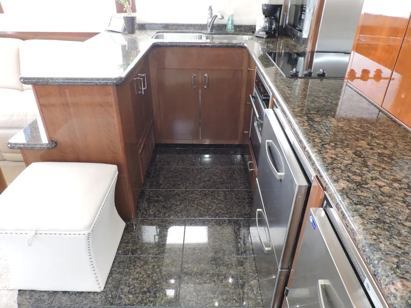 Slide: The Image of Luxurious kitchen interior of 2010 Carver 56 Voyager SE yacht with granite countertops. - 12