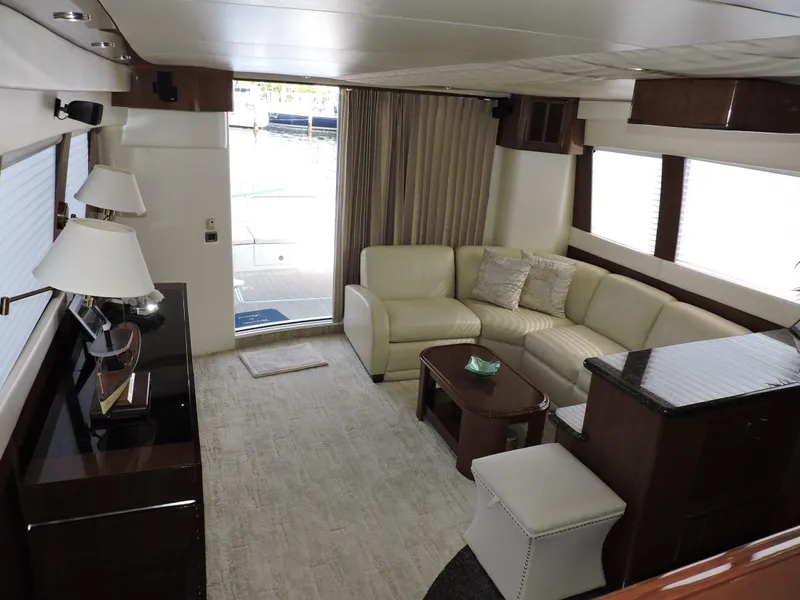 Slide: The Image of Luxurious interior of 2010 Carver 56 Voyager SE yacht with elegant seating and decor. - 26