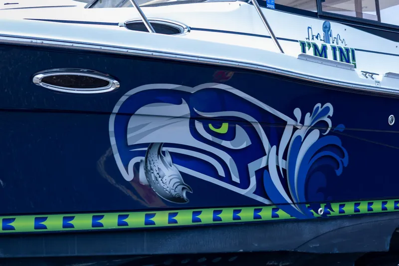 Slide: The Image of 2017 Cutwater C-302 Sport Coupe with bold eagle graphic on the side. - 2